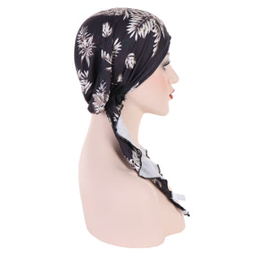 8358 Curved floral pullover cap